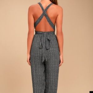 Take a trip black print halter jumpsuit